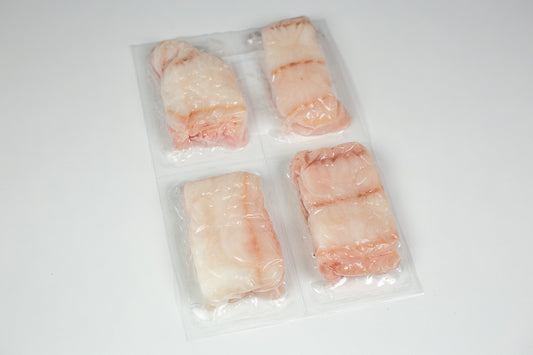 Portions de loup de mer congelées