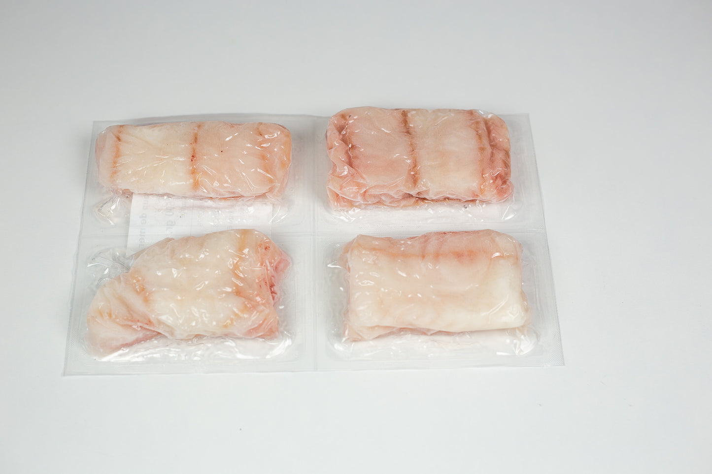 Frozen sea bass portions